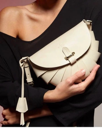 BOLDRINI SELLERIA white small handbag in a female hand