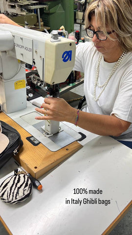 Ghibli bag female artisan working on a professional sewing machine