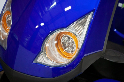 close up of ew-72 scooter headlights