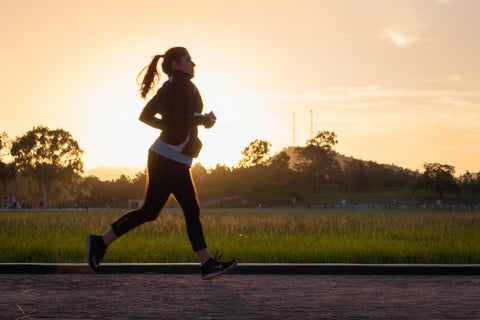 women jogging around sunrise