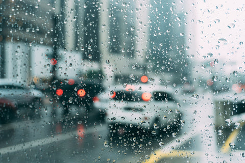 window with raindrops on it