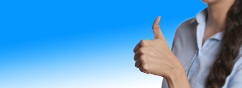 picture of women giving a thumbs up