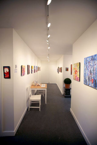 inside Chris Newson's art gallery and framing shop