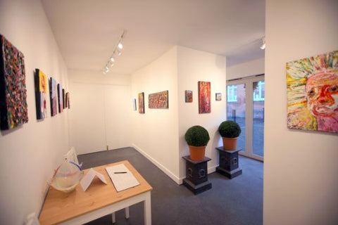 inside Chris Newson's art gallery and framing shop