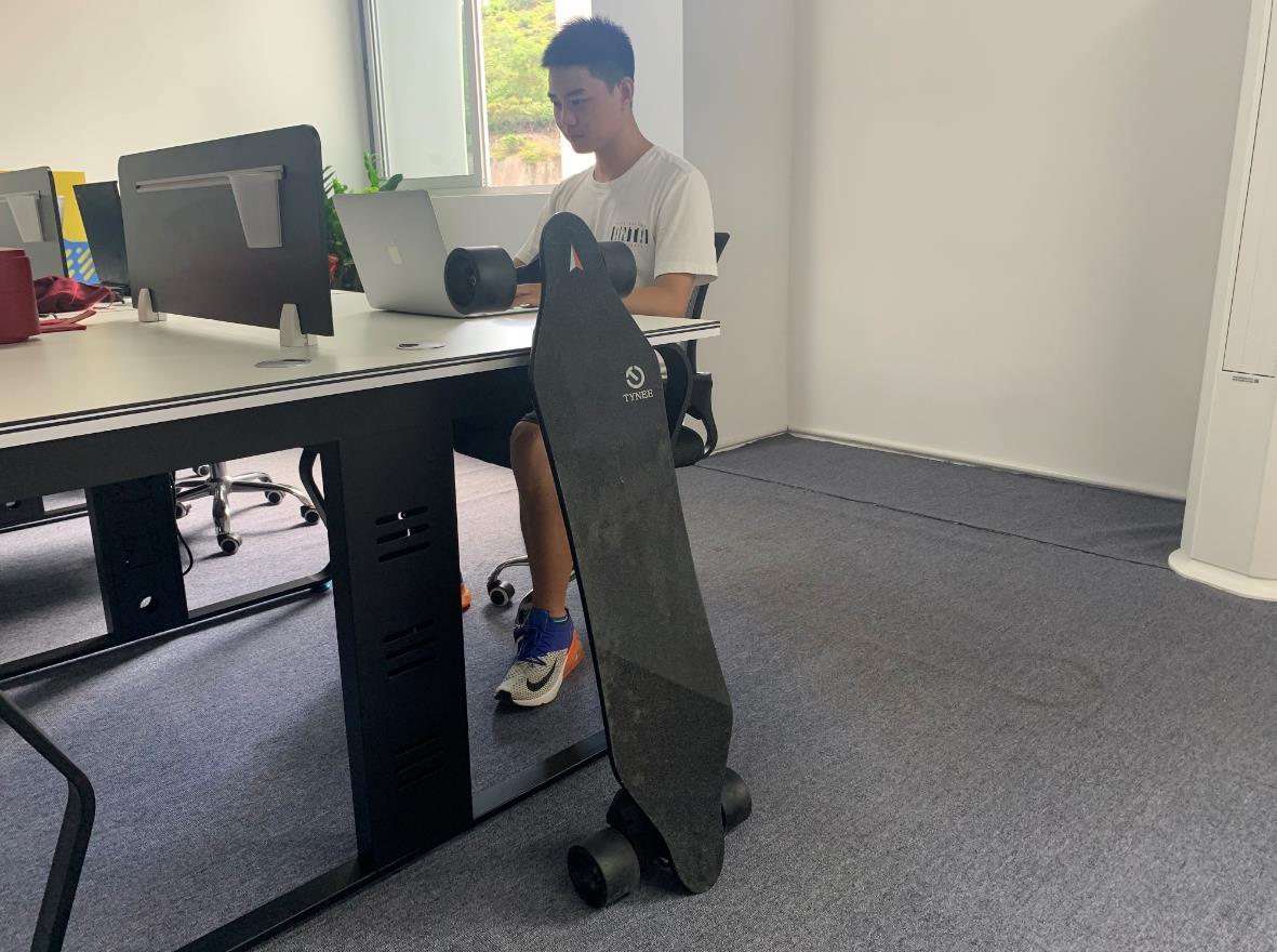 Take Tynee Skateboard In Office