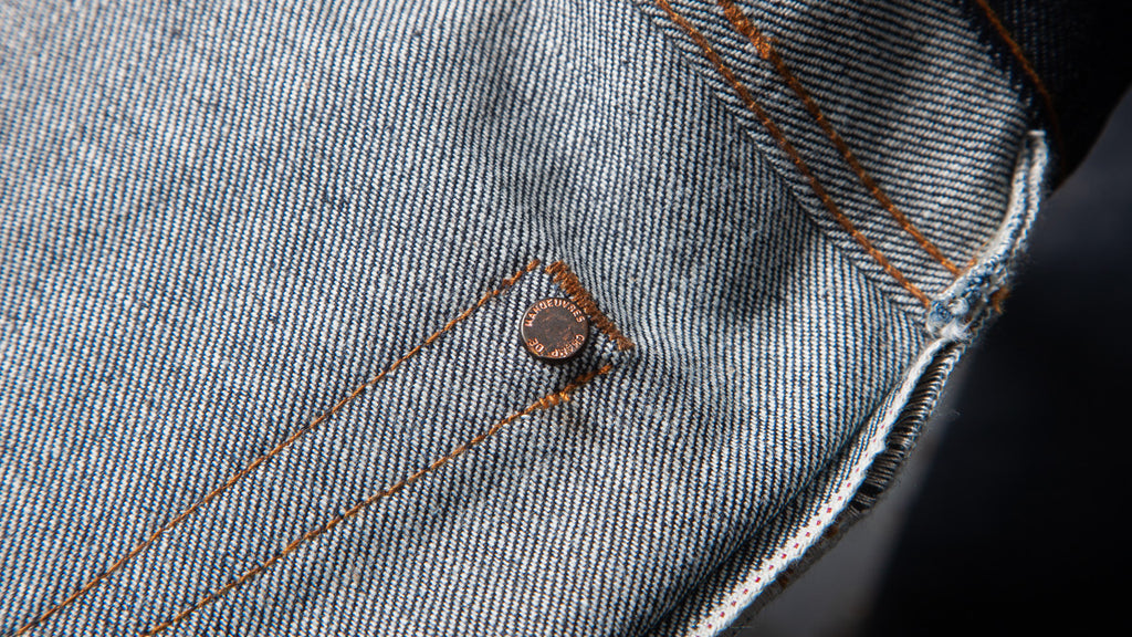 Interior selvedge jean pocket rivets, reinforcing pocket tops for added durability. Exclusive feature of high-end jeans