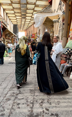 Moroccan Souk, Eve wearing an abaya - traveling artist
