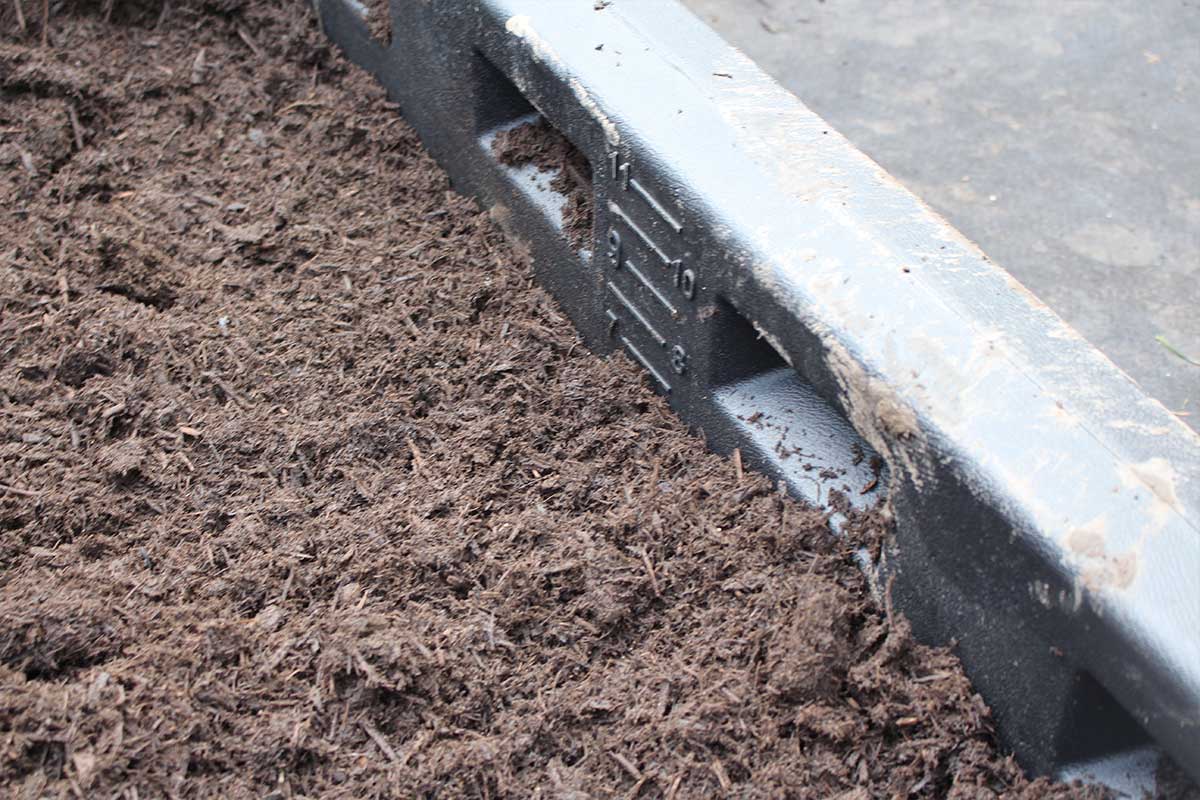 the playground borders have a surfacing guide for that is a big help with mixing soil