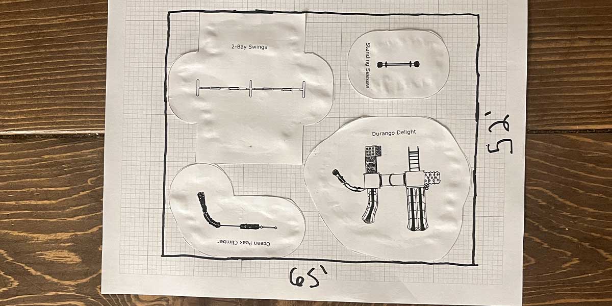 Marking dimensions of playground designed in class