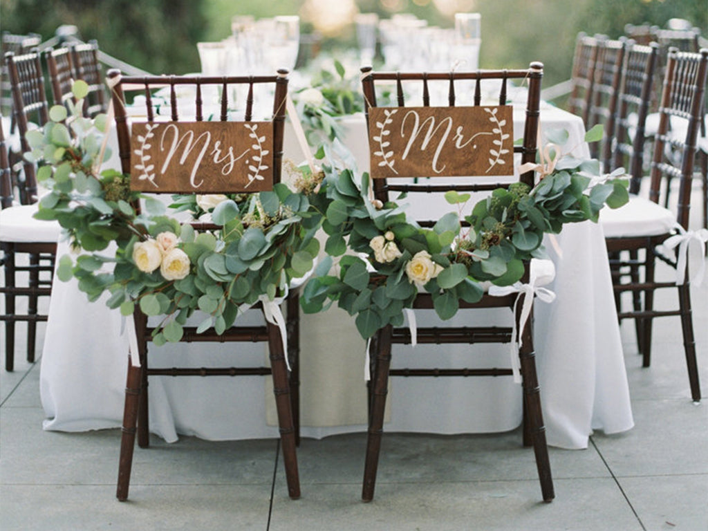 Love Life & Bloom K & V bride and groom chair signs with flowers