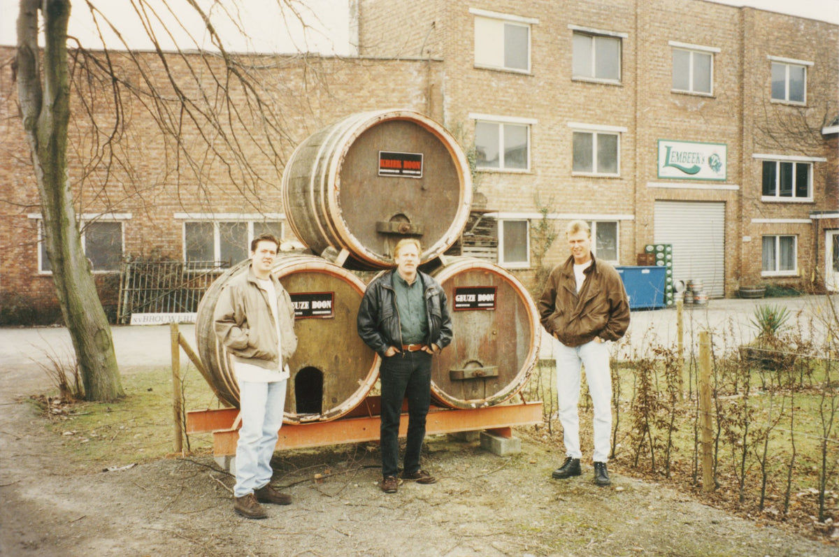 Randy Sprecher flanked by two brewers in Europe