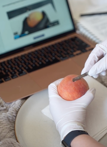 In our online dermaplaning course, you will work on a peach