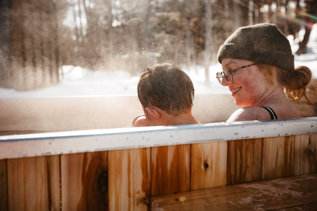 off-grid wood fired hot tub in winter