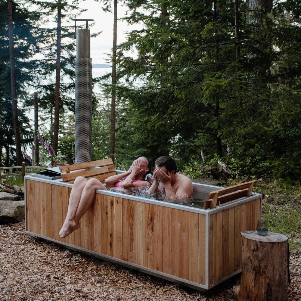 two people in wood fired hot tub