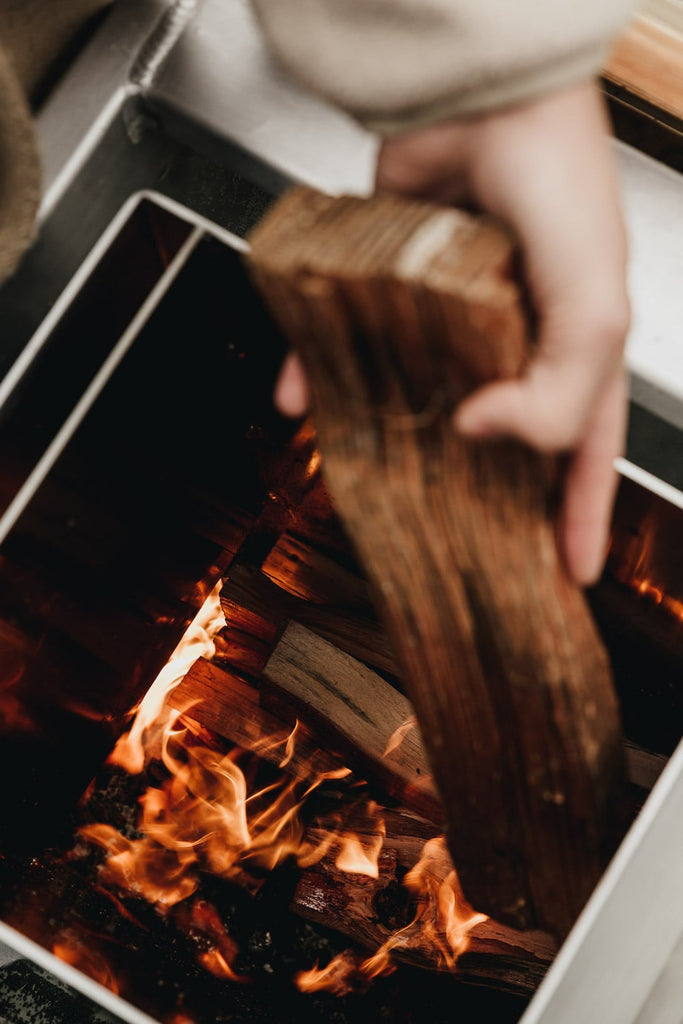 hot tub firebox with wood in winter