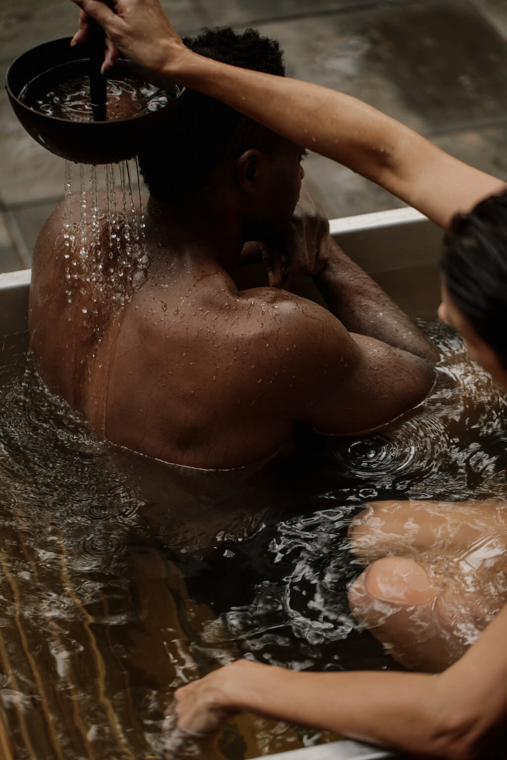 bath ritual with hand shower