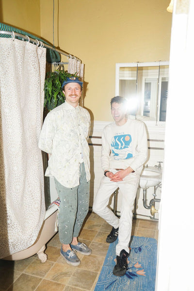 Bathing Culture founders Tim and Spencer by a bathtub