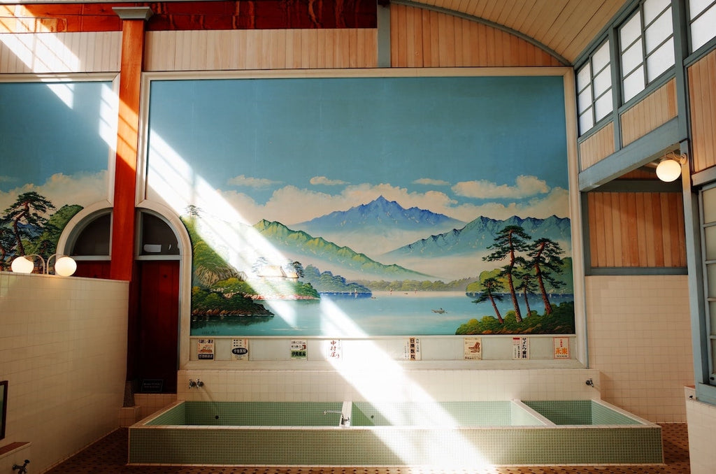 Japanese public bathhouse with mural of nature