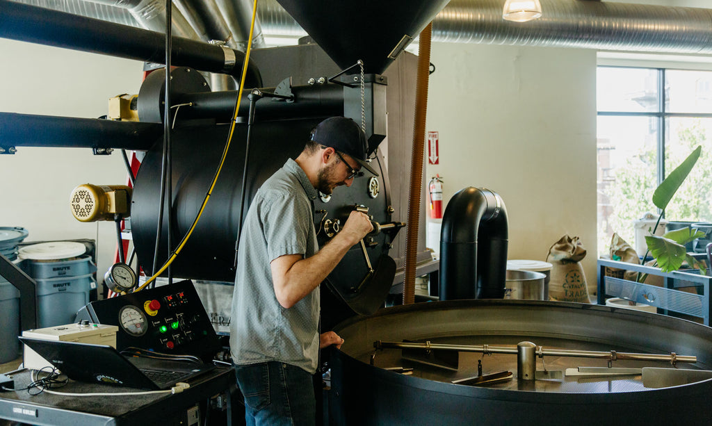 Bret checking coffee from roaster