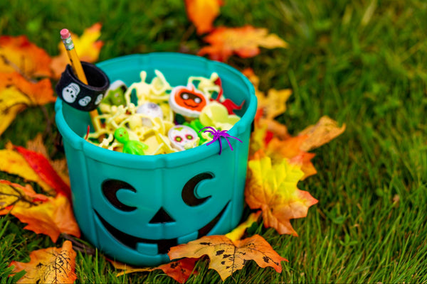 halloween goodies in a jack o'lantern bucket