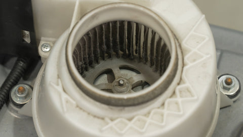 Air intake fan on a hybrid battery with accumulated dust and debris