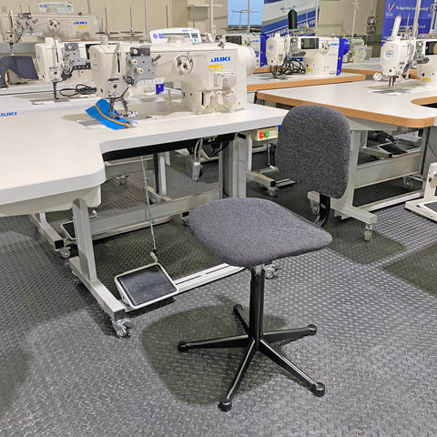 Picture showing an AE2 Sewing Machinists chair in a workshop