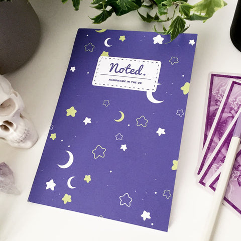 A5 notebook with a purple cover