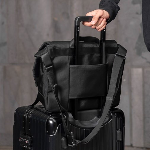 Luggage Holder including Pocket