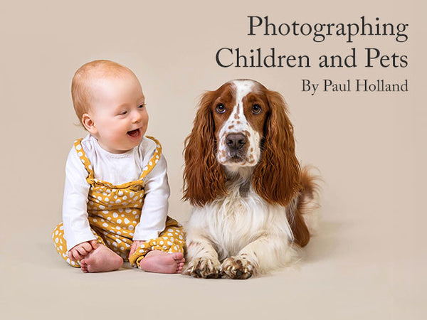 Image shows a young girl sitting next to a pet dog