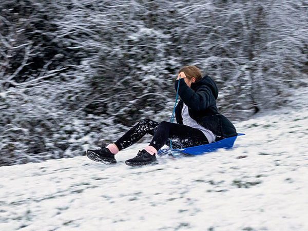 Girl sledging