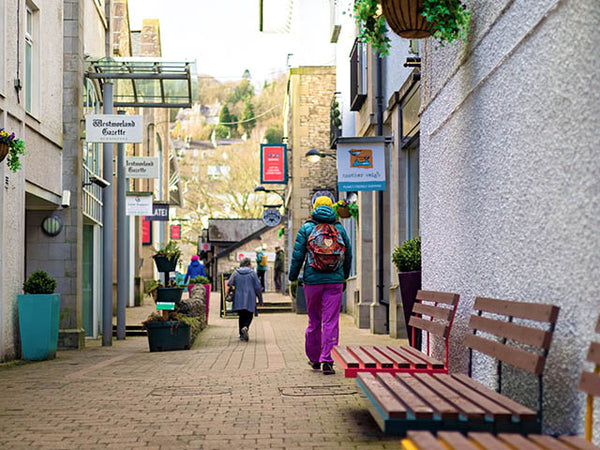 Image shows shoppers in a Kendal Yard