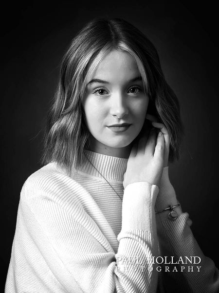 Black and white studio portrait of a girl