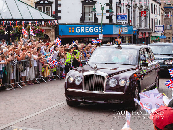The arrival of Queen Elizabeth and Princess Anne in a Bentley State Limousine