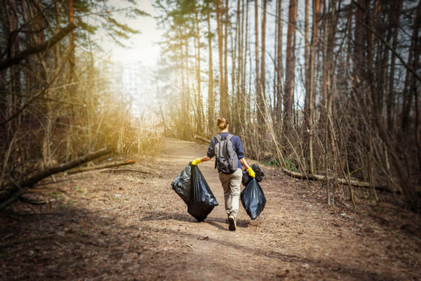 man clearing forest