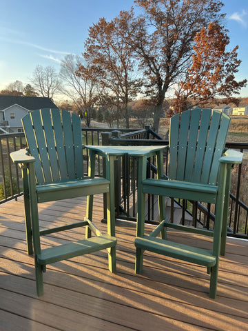 tall adirondack chairs with table on deck 