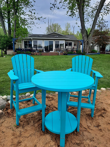 teal outdoor bar table and chairs set on beach