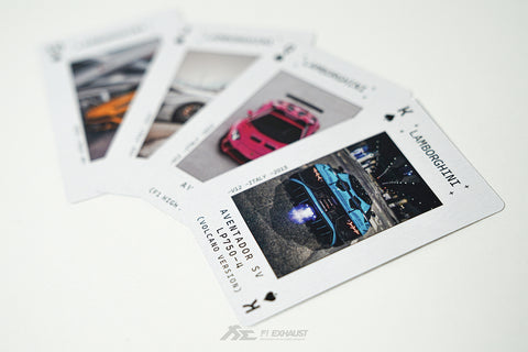 4 face poker playing cards fanned out on the table featuring Lamborghini models.