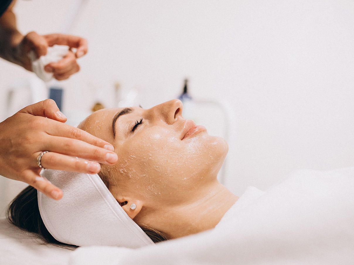 Woman getting a facial mask