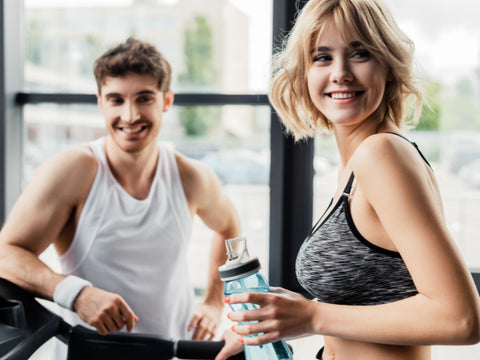 fitness girl and guy at the gym