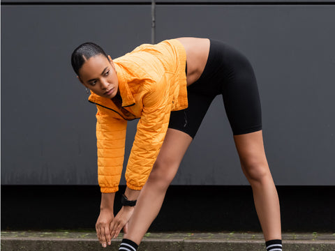 Girl wearing black shorts and jacket