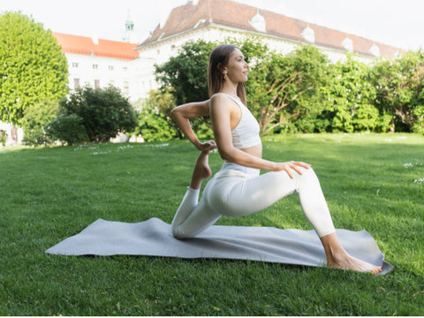 fitness girl doing yoga with a white leggings with a white leggings