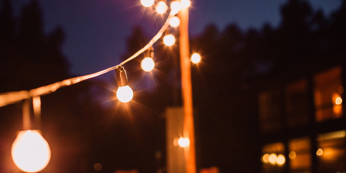 Festoon lights hanging in a garden