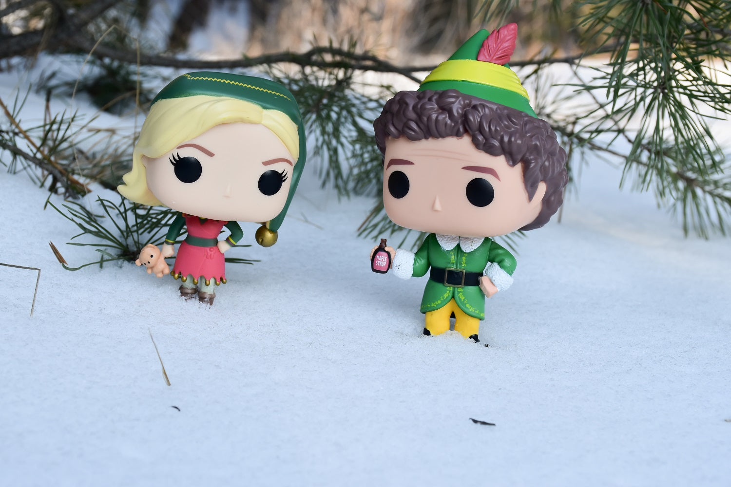 buddy the elf and jovie Pop! action figures in the snow