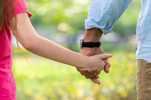 father and daughter holding hands, DEI resources for parents