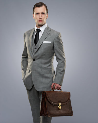 Business man in grey suit and briefcase