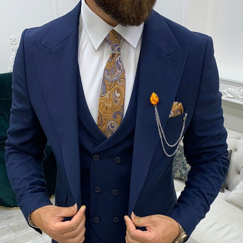 Wide peak lapels on a navy suit. Made perfectly for bodybuilders and larger men.