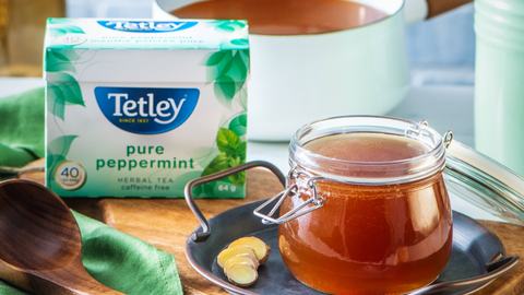 Beautiful food photography: a glass container filled with comforting and restorative bone broth. Recipe made using Tetley Pure Peppermint tea. 