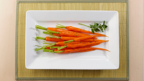 Beautiful food photography: tray of spiced carrots infused with tea. Recipe made using Tetley Rooibos tea. 