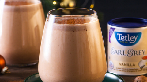 Beautiful food photography: two cups of holiday nog with a tea twist! Recipe made using Tetley Earl Grey Vanilla tea. 