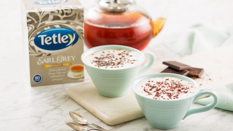 Beautiful food photography: two blue mugs filled with a chocolate latte. Recipe made using Tetley Earl Grey tea. 